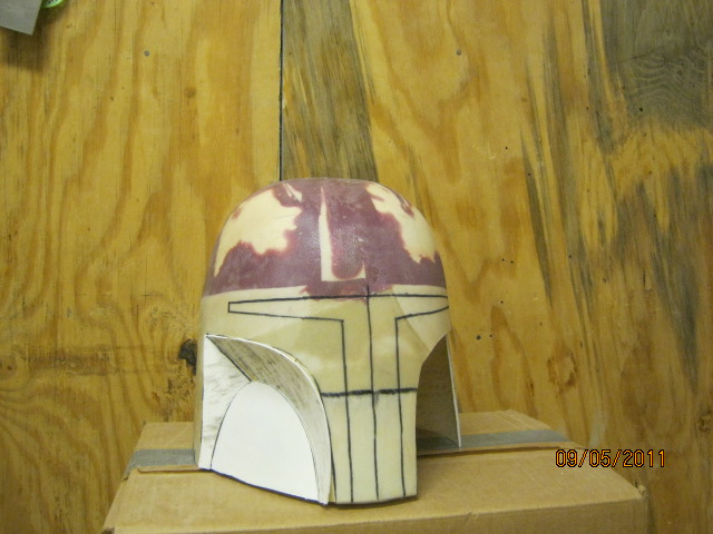 helmet 9 first layer of fiberglass and cheek cut outs.JPG